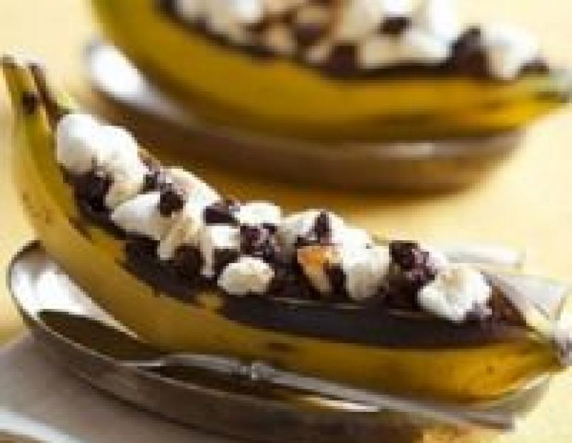 Comment recouvrir les bananes de chocolat.  Recette de bananes enrobées de chocolat.  Bananes enrobées de chocolat noir sur bâtonnets