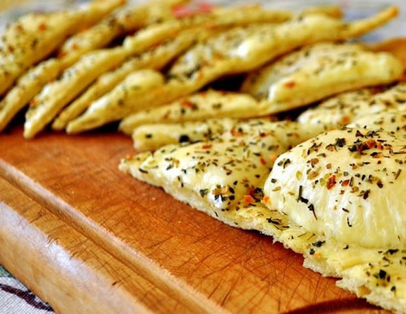 Foodclub: recetas culinarias con fotografías paso a paso.  Cocina italiana, comida en Italia Preparando focaccia fina.